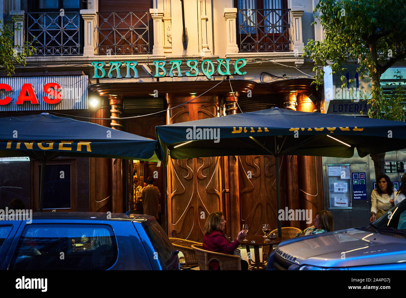 A view of Modernist Bar Basque from the street with it's iconic signage and wooden carved front Stock Photo
