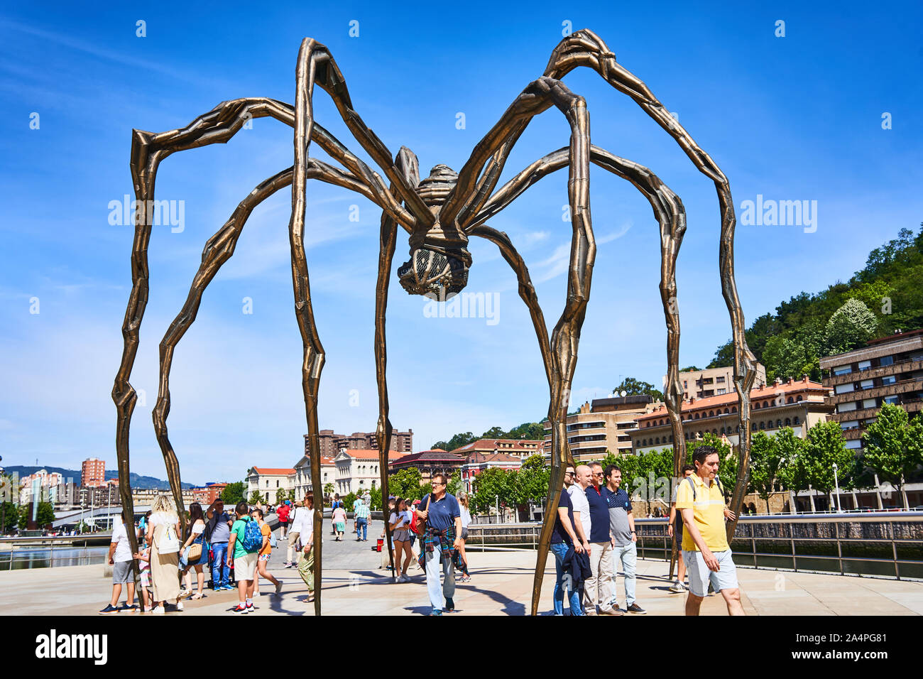 Maman, a spider sculpture by Louise Bourgeois (1999) standing outside the  Guggenheim in Madrid on the riverside Stock Photo - Alamy