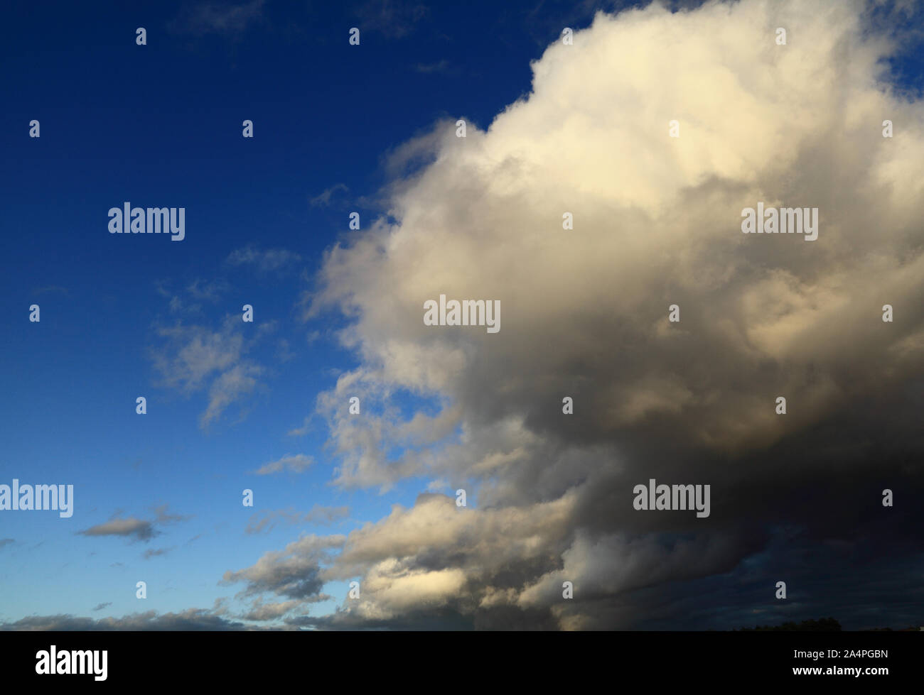 Blue sky, white, grey, dark cloud, clouds, meteorology Stock Photo