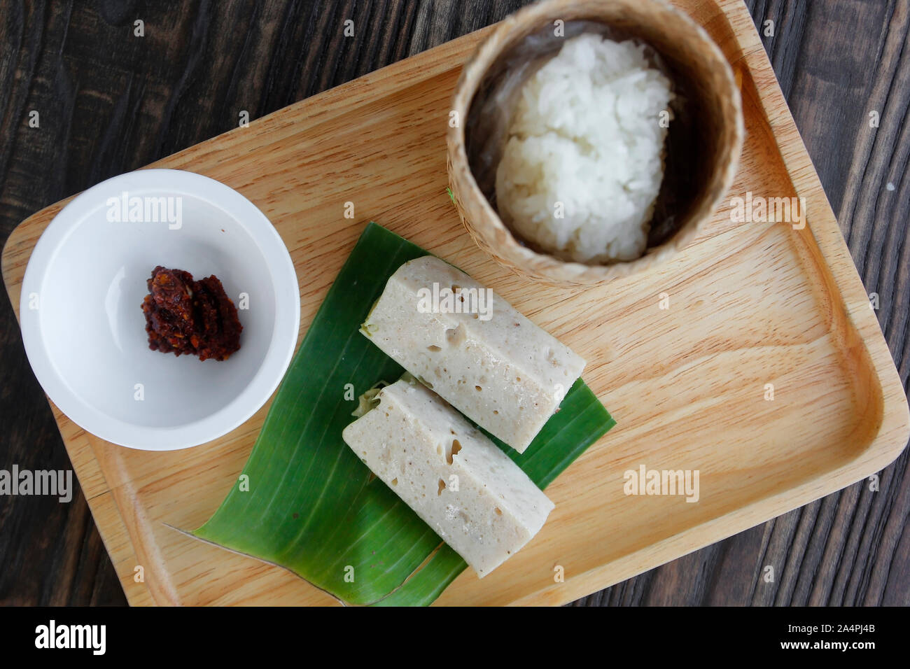Thai food, Vietnamese pork sausage with red hot chili dip and sticky rice Stock Photo