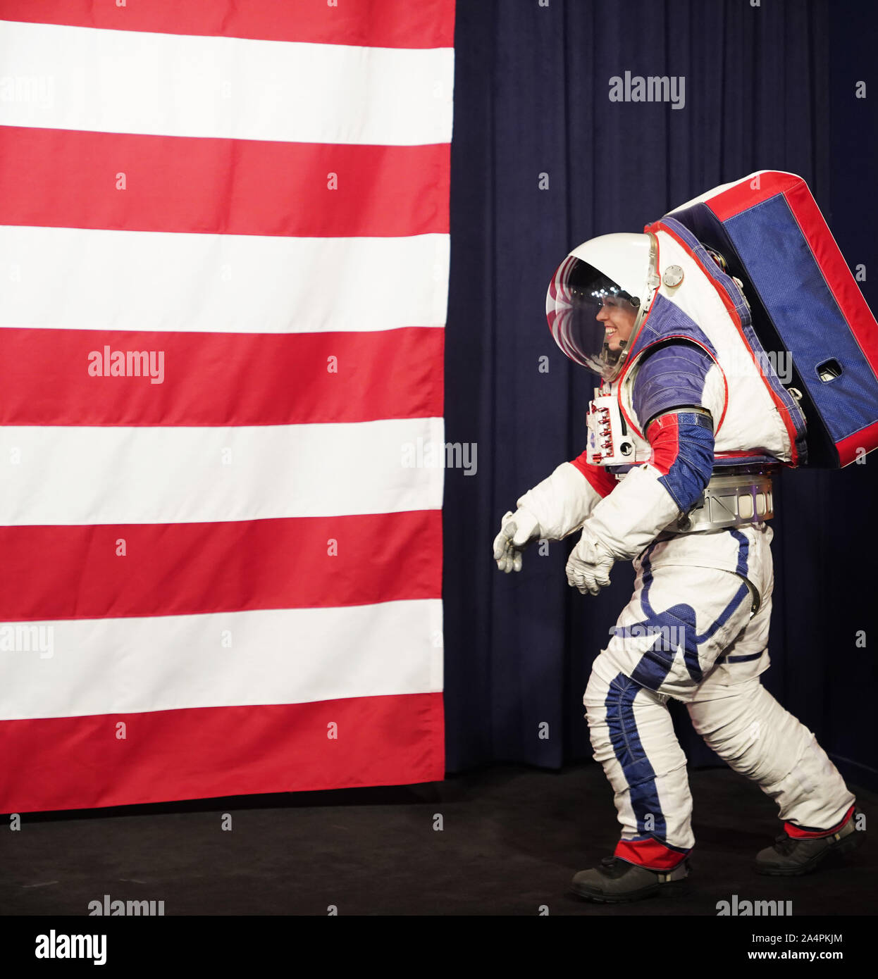Washington, USA. 15th Oct, 2019. Advanced Space Suit Engineer Kristine Davis displays the Exploration Extravehicular Mobility Unit (xEMU) spacesuit at NASA headquarters in Washington, DC, the United States, on Oct. 15, 2019. The U.S. space agency NASA unveiled on Tuesday the next-generation spacesuits to be used in its Artemis program that will send the first woman and next man to the Lunar South Pole by 2024. Credit: Liu Jie/Xinhua/Alamy Live News Stock Photo