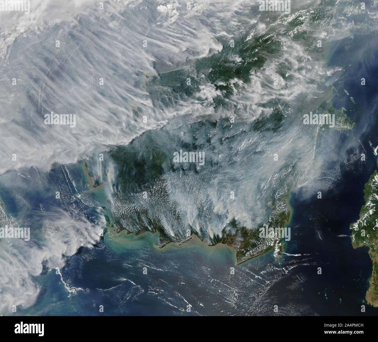Peat Wildfires, Kalimantan portion of Borneo and Sumatra, September 14, 2019, by NASA/DPA Stock Photo