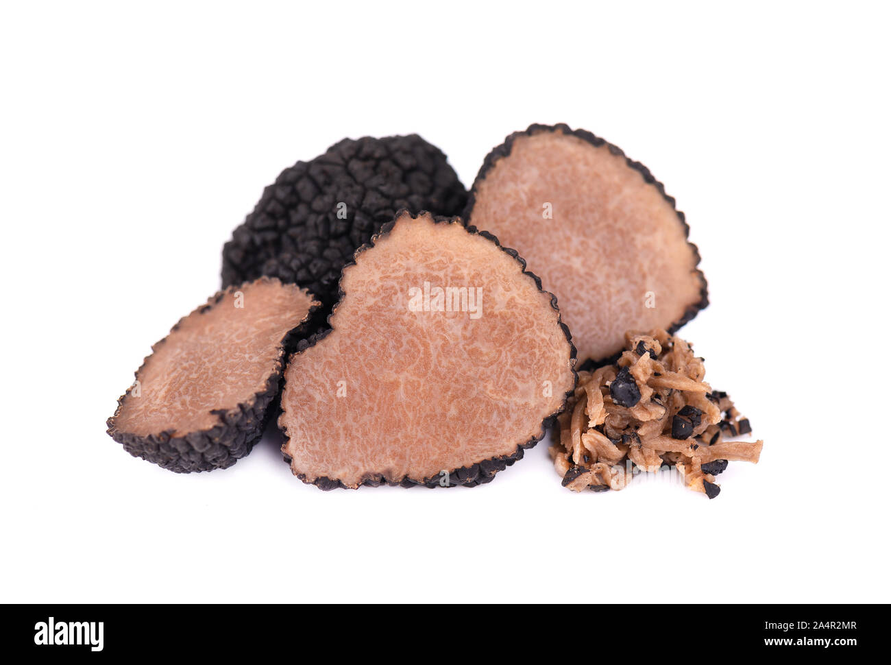 Grated Truffle. Fresh black truffles isolated on a white background
