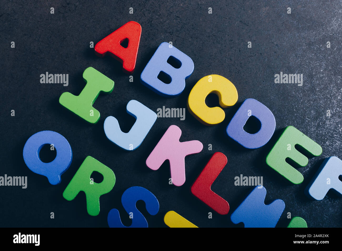 Alphabet ABC wooden letters for early education concept Stock Photo - Alamy