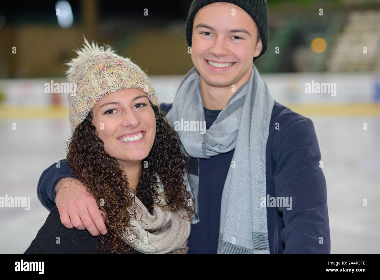 Active young couple ice skating hi-res stock photography and images - Alamy