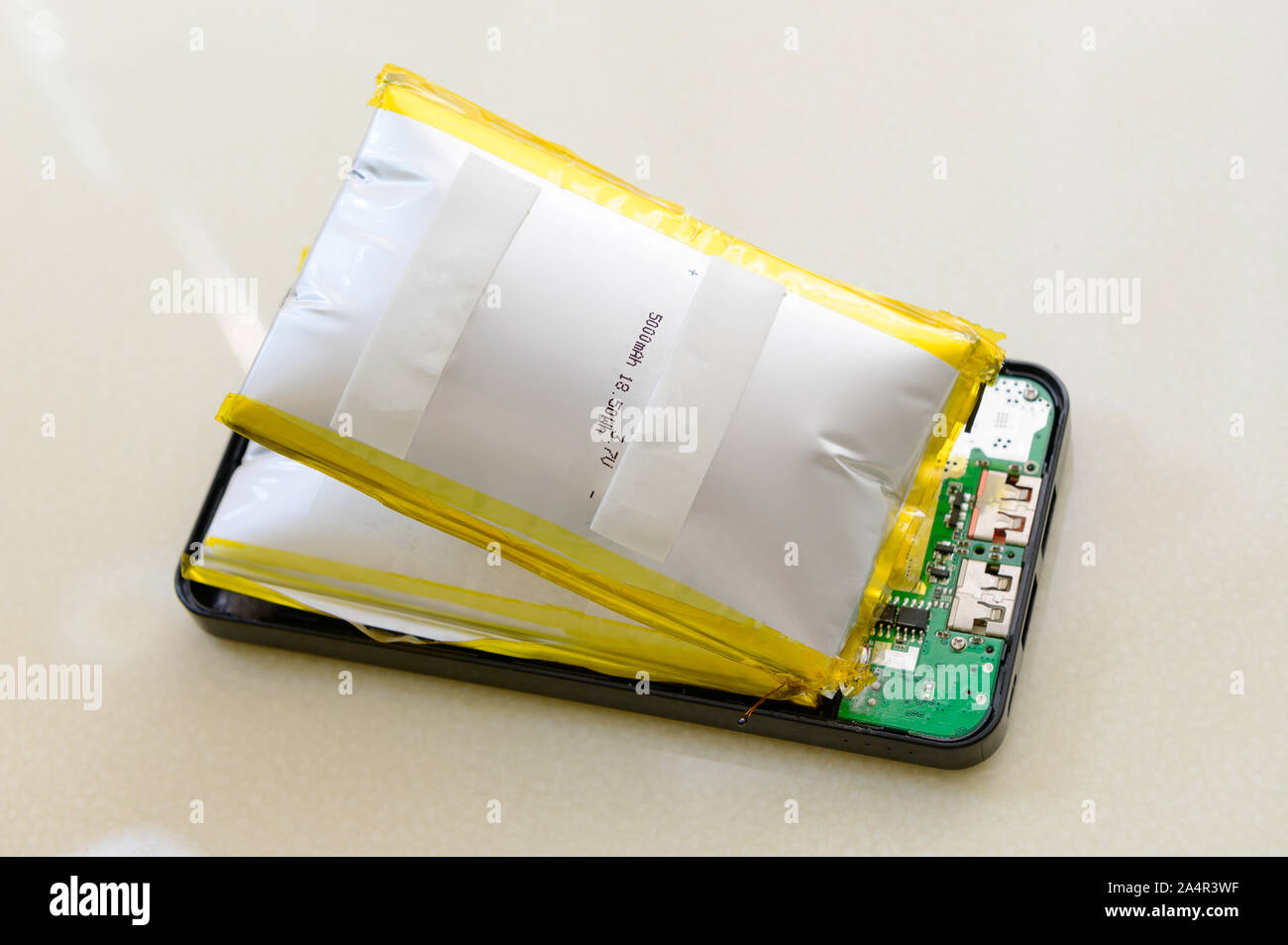 Old lithiumion battery has expanded Stock Photo Alamy