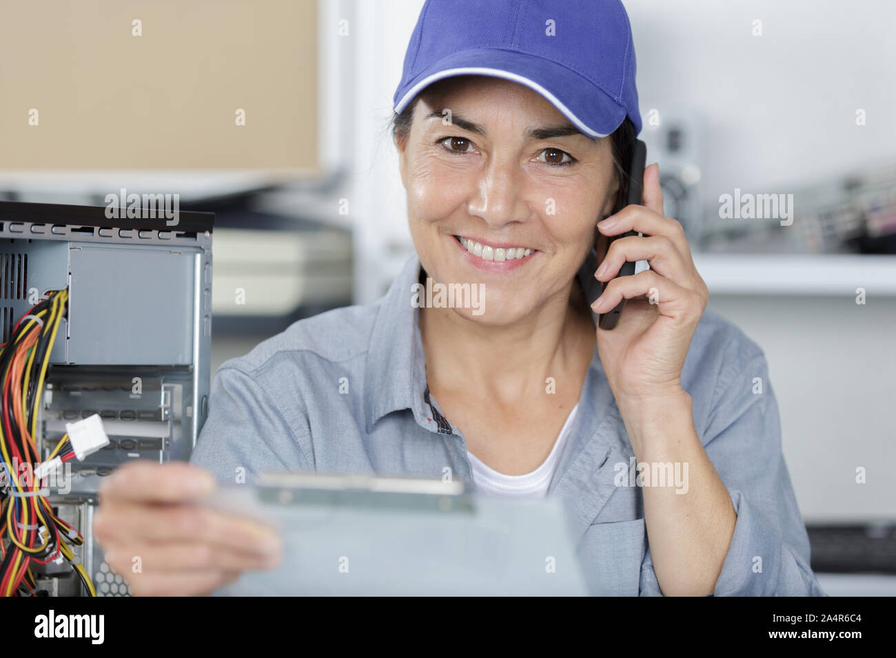 female researcher technician on the phone Stock Photo