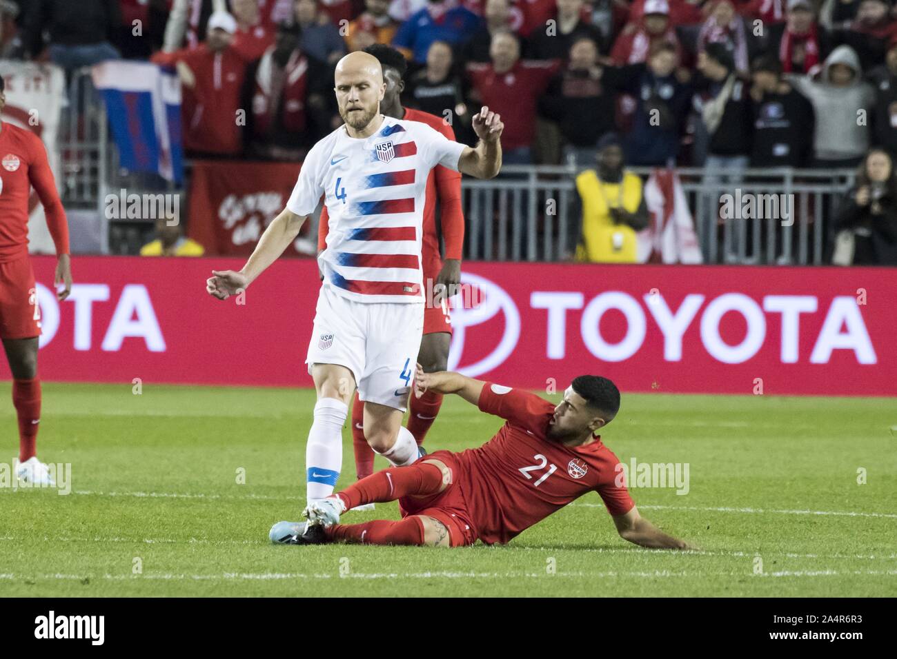 Toronto, Ontario, Canada. 15th Oct, 2019. Michael Bradley (4) and Jonathan Osorio (21) in action during the Canada vs USA - Nations League qualifier game Credit: Angel Marchini/ZUMA Wire/Alamy Live News Stock Photo