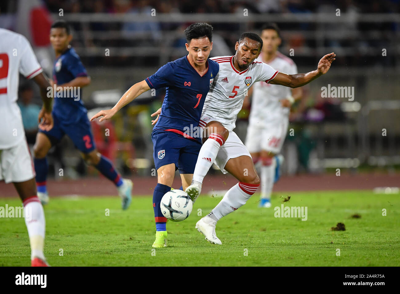 Pathum Thani Thailand 15th Oct 19 Supachok Sarachart Of Thailand No 7 Competes For The Ball With Player Of United Arab Emirates Uae During The Fifa World Cup Asian Second Qualifier Match Between Thailand