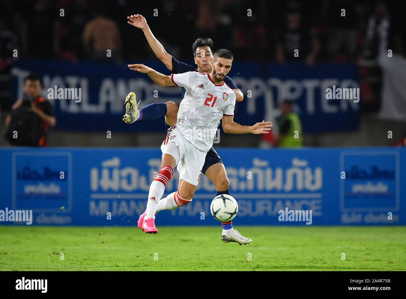 Pathum Thani Thailand 15th Oct 19 Tariq Ahmed Of United Arab Emirates Uae No 21 Competes For The Ball With Player Of Thailand During The Fifa World Cup Asian Second Qualifier Match Between