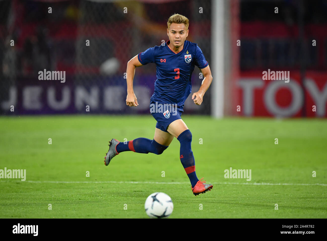 Pathum Thani Thailand 15th Oct 19 Theerathon Bunmathan Of Thailand No 3 Competes For The Ball With Player Of United Arab Emirates Uae During The Fifa World Cup Asian Second Qualifier Match Between Thailand