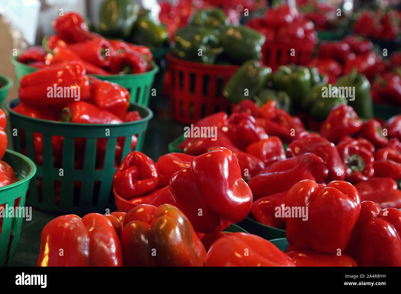 Biologic, natural cultivated sweet pepper on a market counter. Vegetables from the farmers market. Ecologic products. Natural background. Stock Photo
