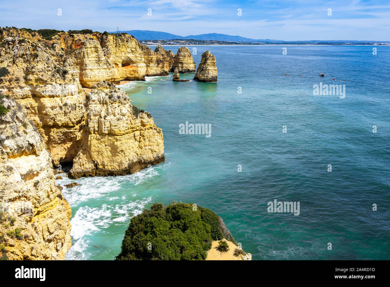 Scenic natural landscape of Algarve coastline near Lagos with cliffs overlooking the Atlantic Ocean, Portugal Stock Photo