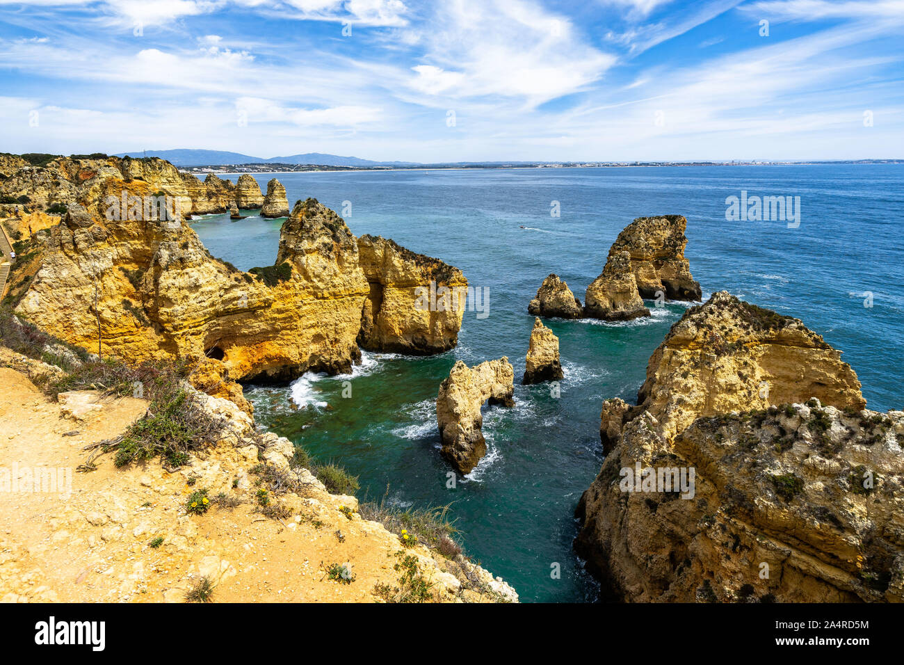 Algarve cliffs and coastline overlooking the Atlantic ocean viewed from Ponta da Piedade, Portugal Stock Photo