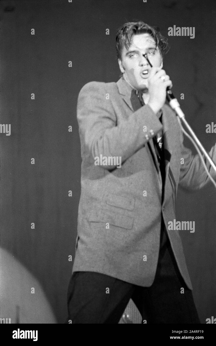 Elvis Presley during a performance at the University of Dayton Fieldhouse, May 27, 1956. Stock Photo