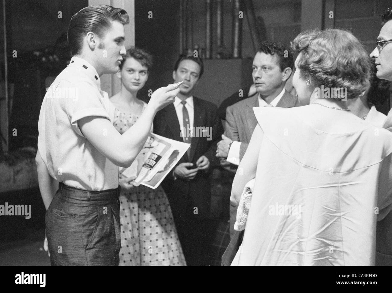 Elvis Presley backstage with fans at the University of Dayton Fieldhouse, May 27, 1956. Stock Photo