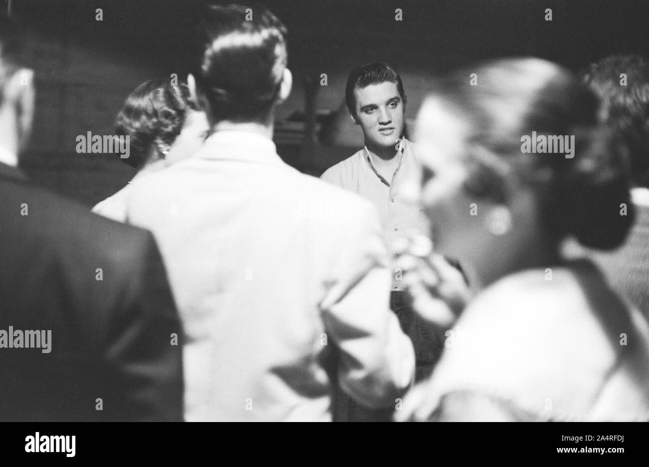 Elvis Presley backstage with fans at the University of Dayton Fieldhouse, May 27, 1956. Stock Photo