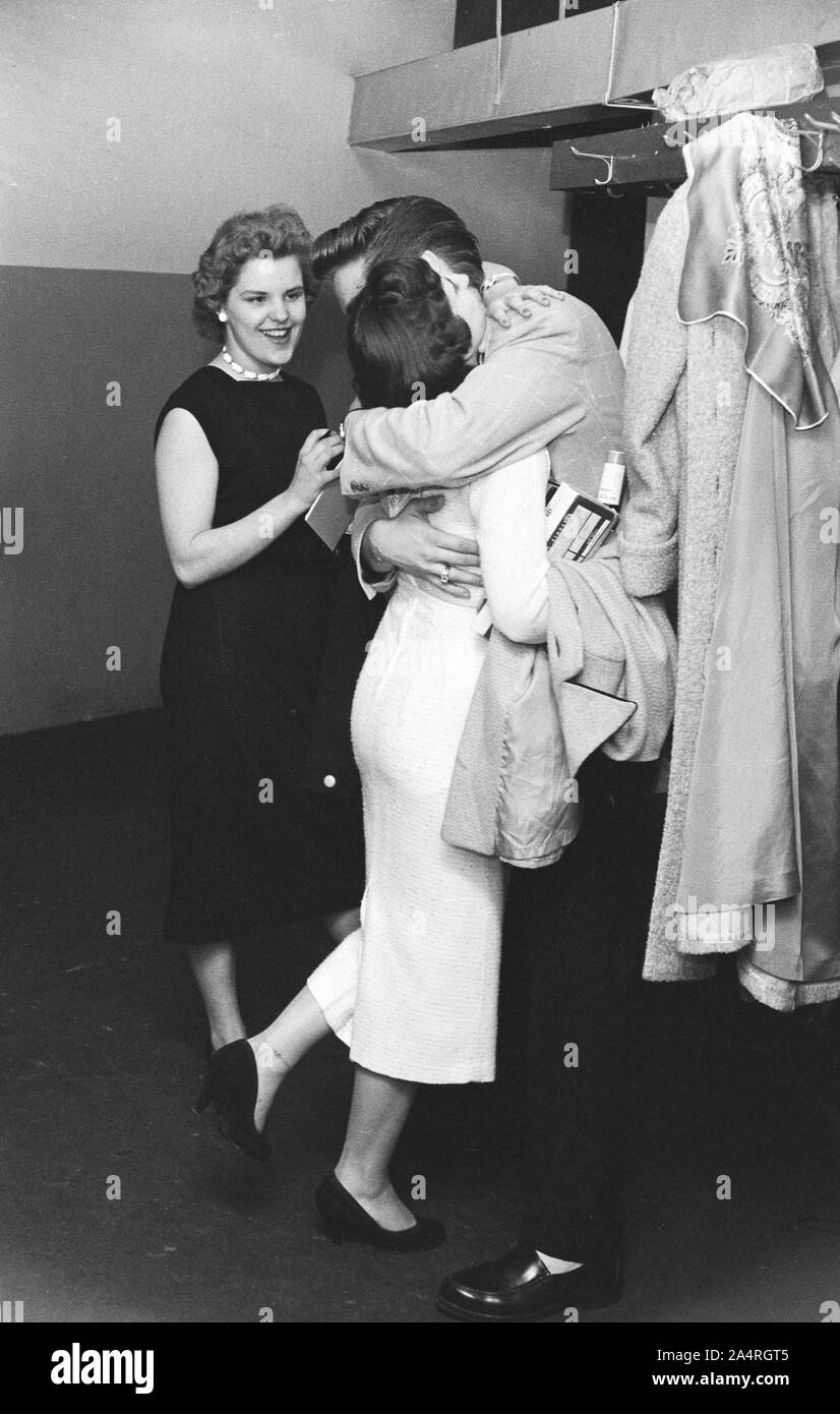 Elvis Presley speaking with fans at an adult party after his show at the Fox Theater, Detroit, Michigan, May 25, 1956. Stock Photo