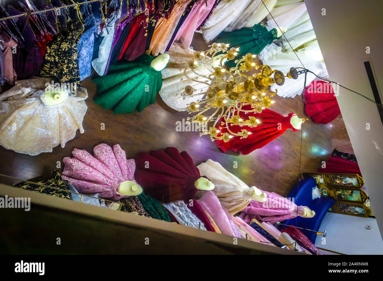 Department of dresses in the women's clothing store. Stock Photo