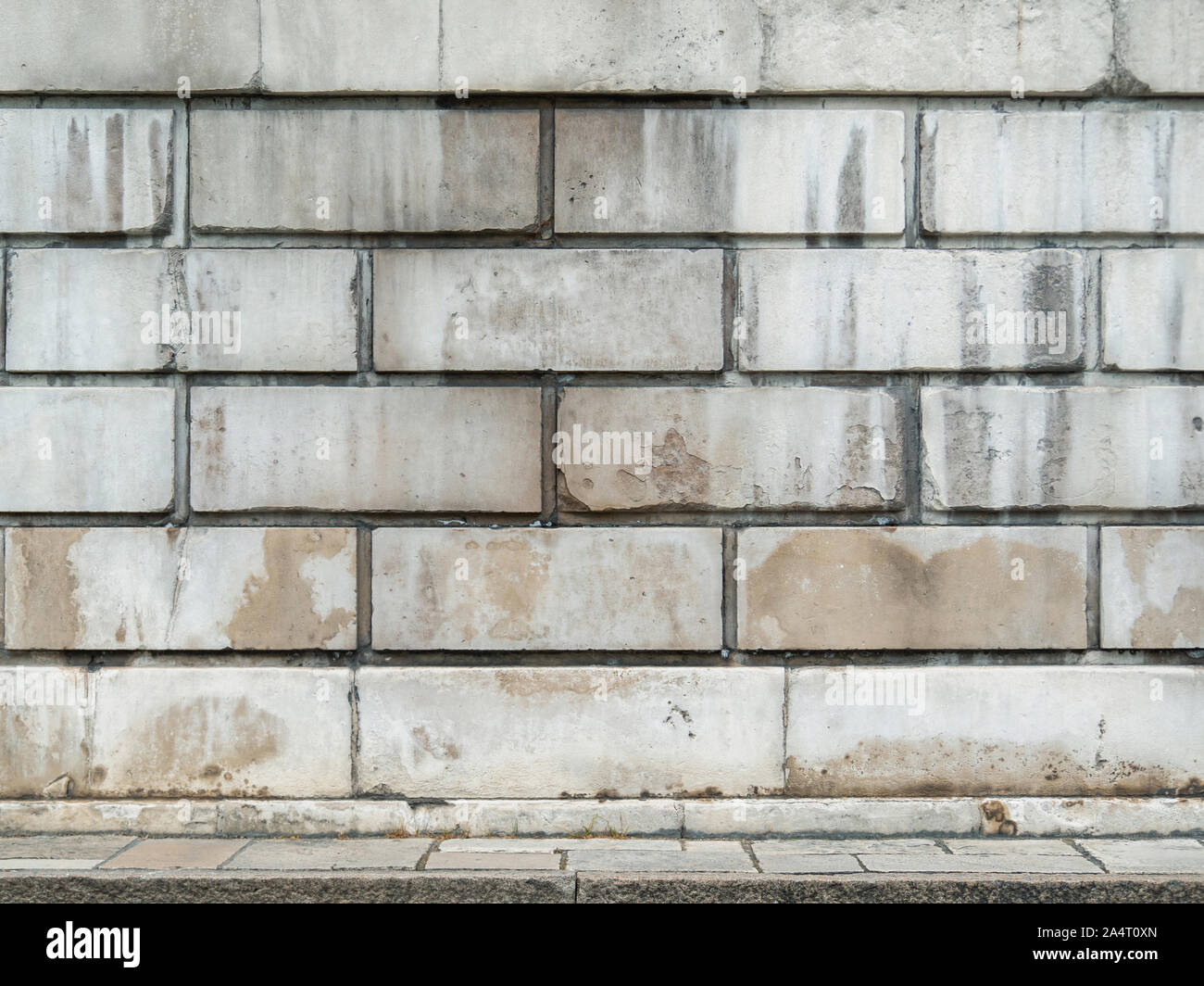White brick wall background and concrete floor Stock Photo - Alamy