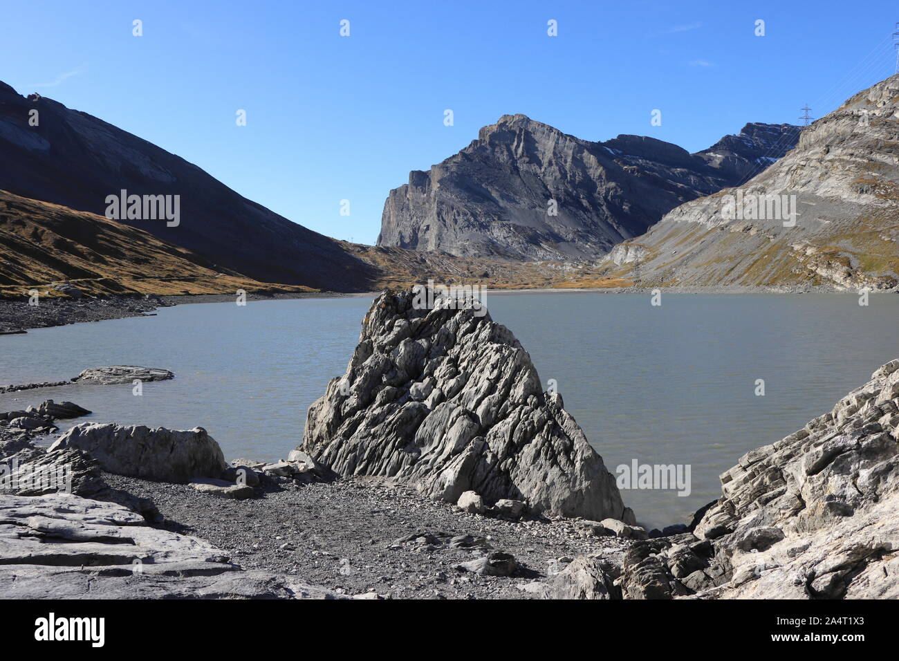 Daubensee is a mountain lake close to Leukerbad, located in the alps of Switzerland. Stock Photo
