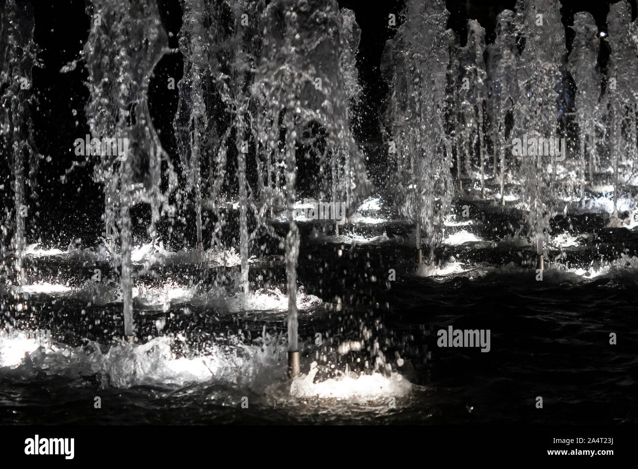 Beautiful fountain in the night city, night fountain Stock Photo - Alamy