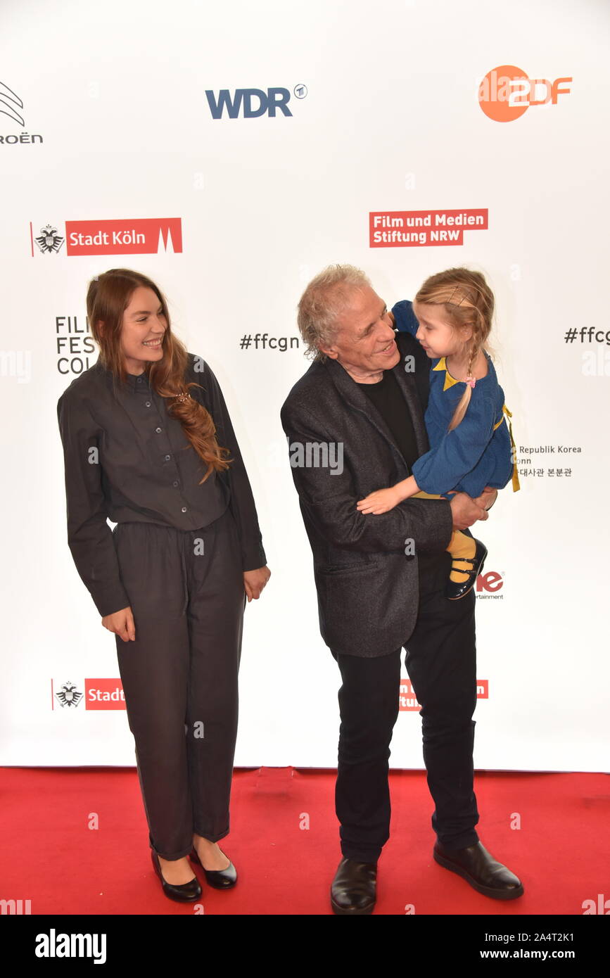 Cologne, Germany. 15th Oct, 2019. the US American director Abel Ferrara, actor Anna Ferrara (child), Cristina Chiriac comes to the screening of the film ' Tommaso ' at the Film Festival Cologne, international film and television festival. Credit: Horst Galuschka/dpa/Alamy Live News Stock Photo
