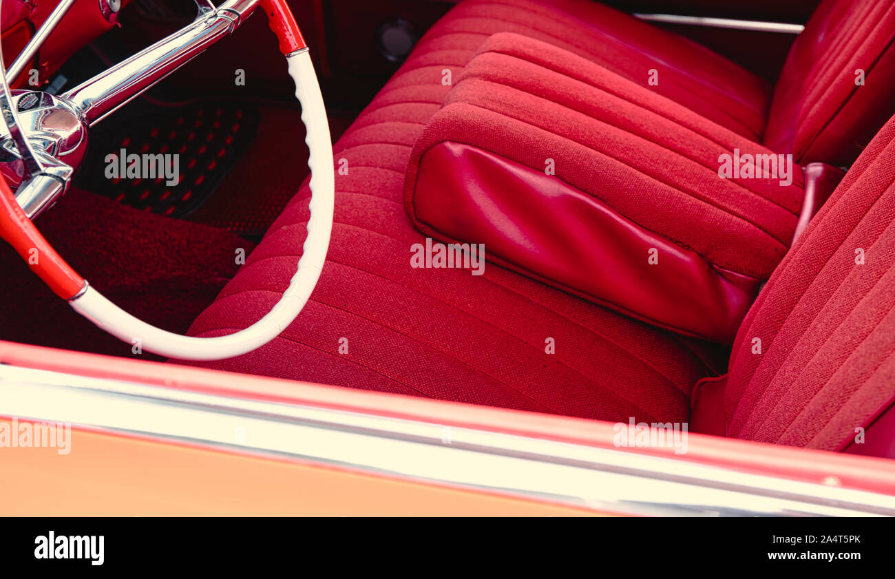 Interior of classic car with red upholstery, Nottingham Transport Festival, Autokarna 2019, Wollaton Park, Nottingham, east Midlands, England Stock Photo