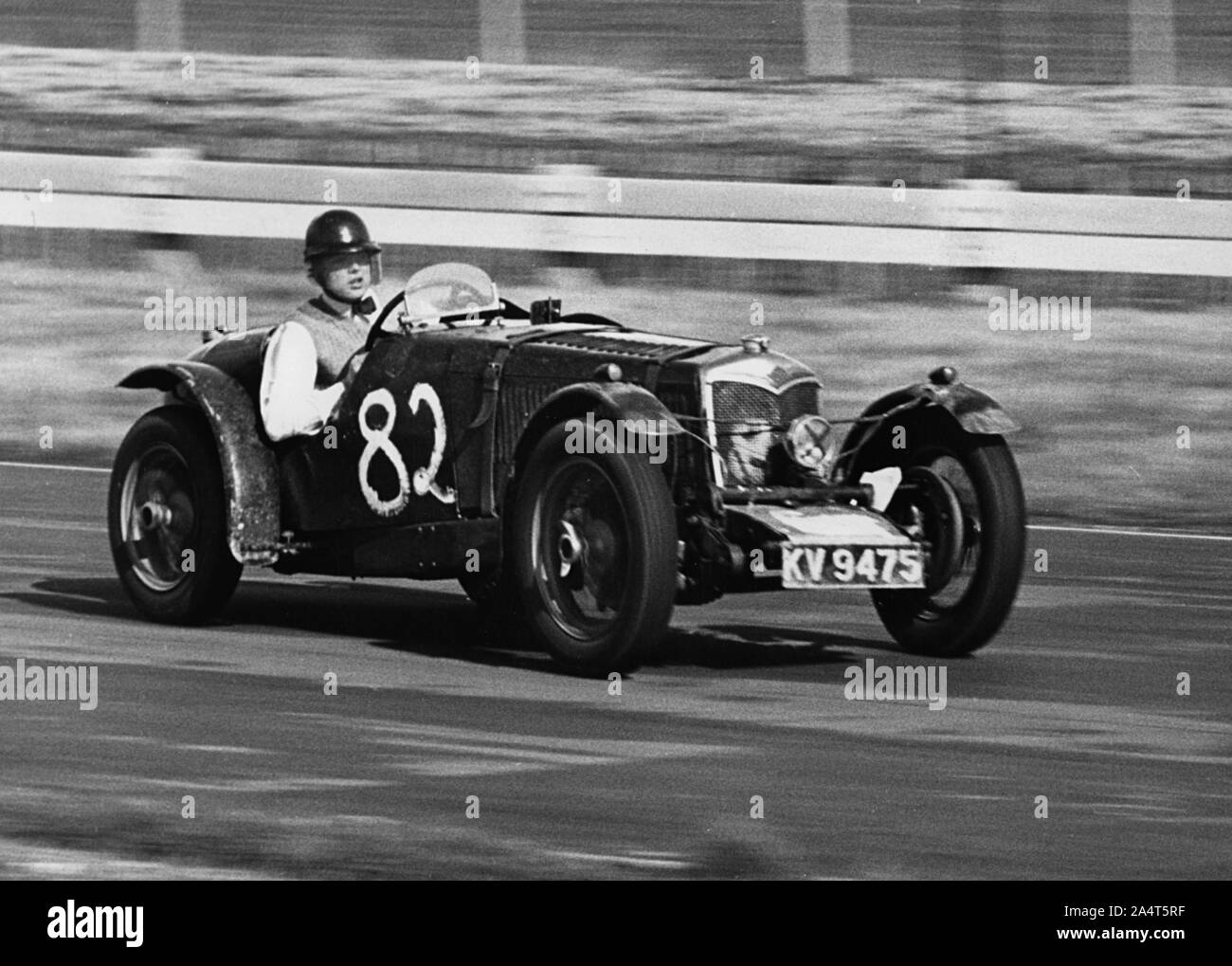 1934 Riley Imp driven by Mike Hawthorn at Goodwood. Stock Photo