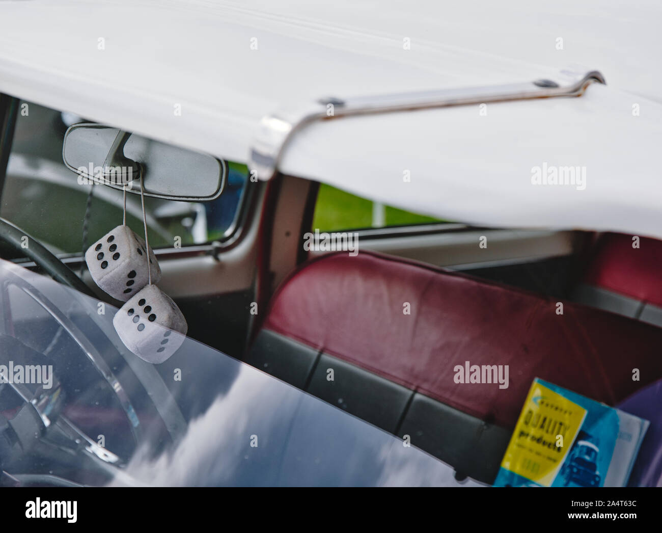 Classic car with external sun visor and hanging dice, Nottingham Transport Festival, Autokarna 2019, Wollaton Park, Nottingham, east Midlands, England Stock Photo