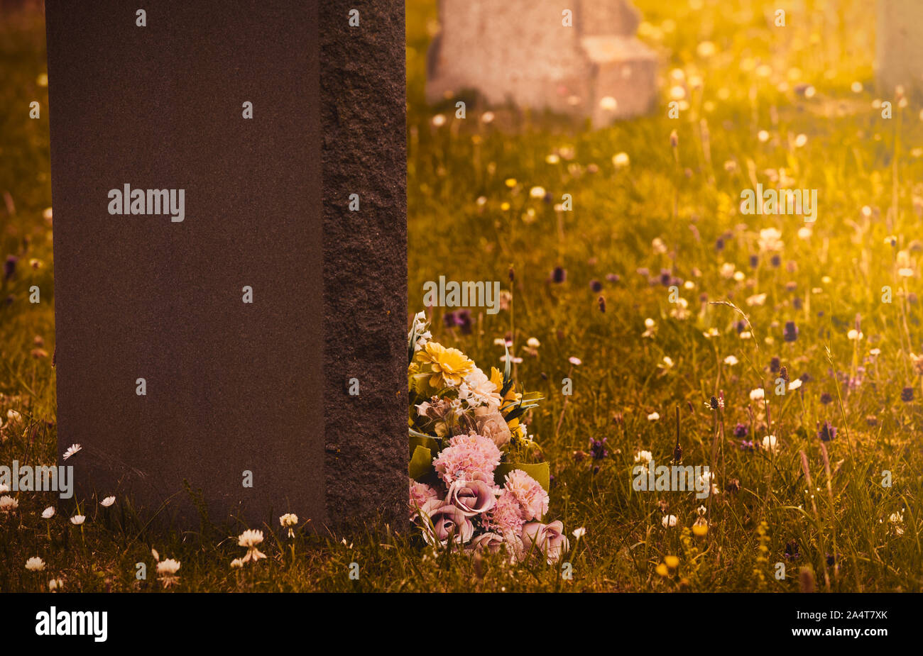 Flowers on gravestone hires stock photography and images Alamy