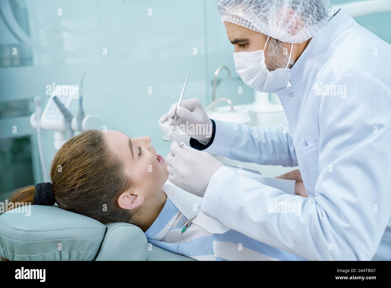 Professional dentist preventing caries using restoration instruments