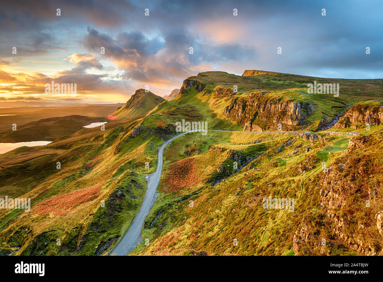 Dramatic sunrise sky over the Quiraing hills on the Trotternish peninsula on the Isle of Skye in the Highlands of Scotland Stock Photo