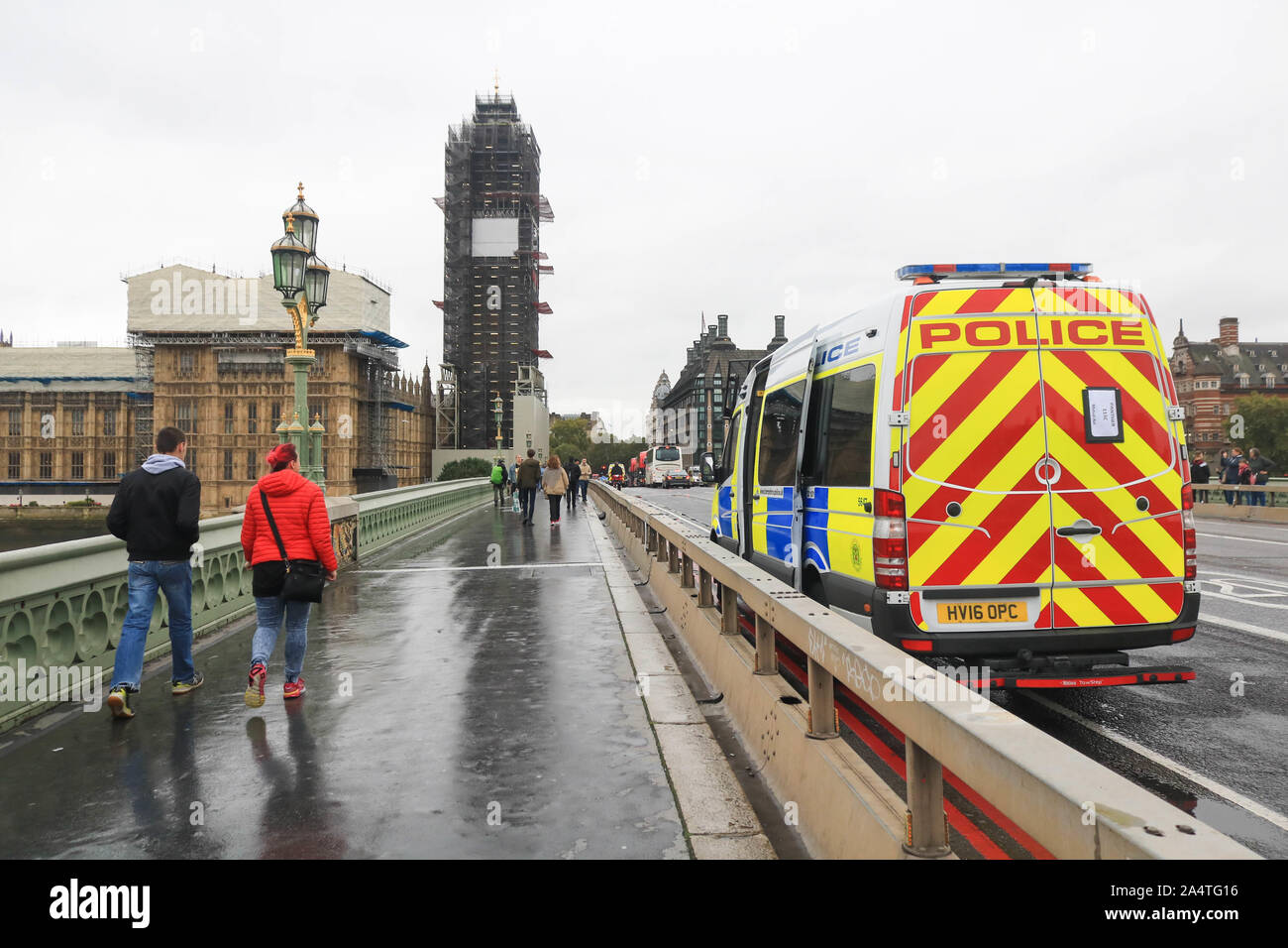 London, UK - 16 October 2019.  Police vans stationed on Westminster Bridge after a section 14 public order was issued banning protest by climate activists from Extinction Rebellion which has thretened to challenge the ban in the High Courts. Credit: amer ghazzal/Alamy Live News Stock Photo