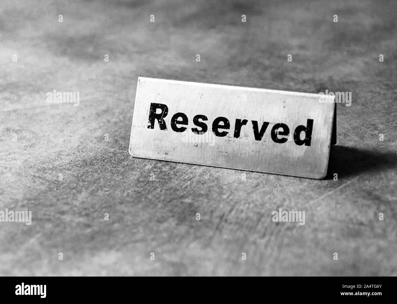 Reserved table sign in restaurant, silver reserved plate, black and ...