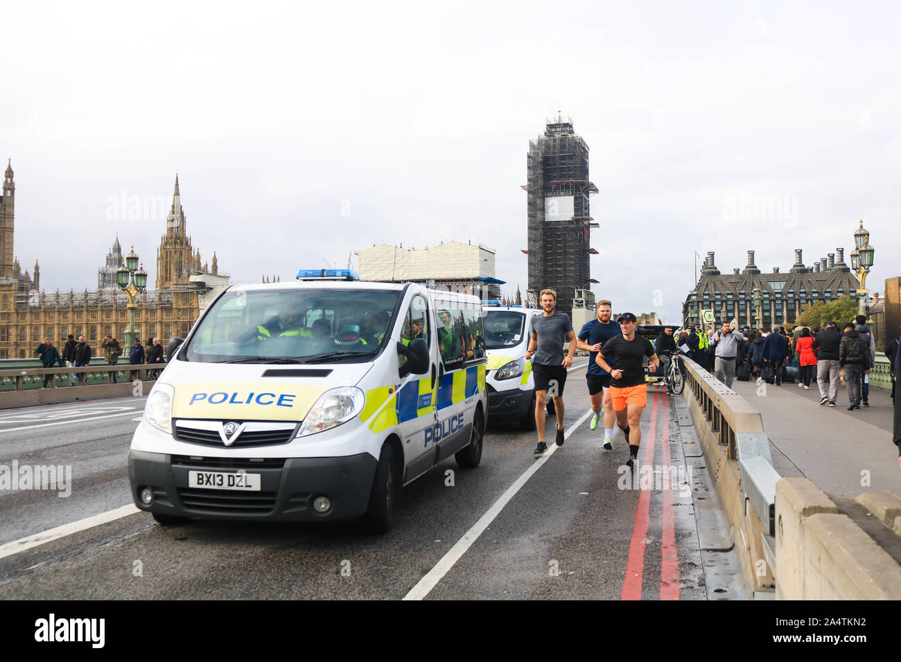 London, UK - 16 October 2019.  Police vans stationed on Westminster Bridge after a section 14 public order was issued banning protest by climate activists from Extinction Rebellion which has thretened to challenge the ban in the High Courts. Credit: amer ghazzal/Alamy Live News Stock Photo
