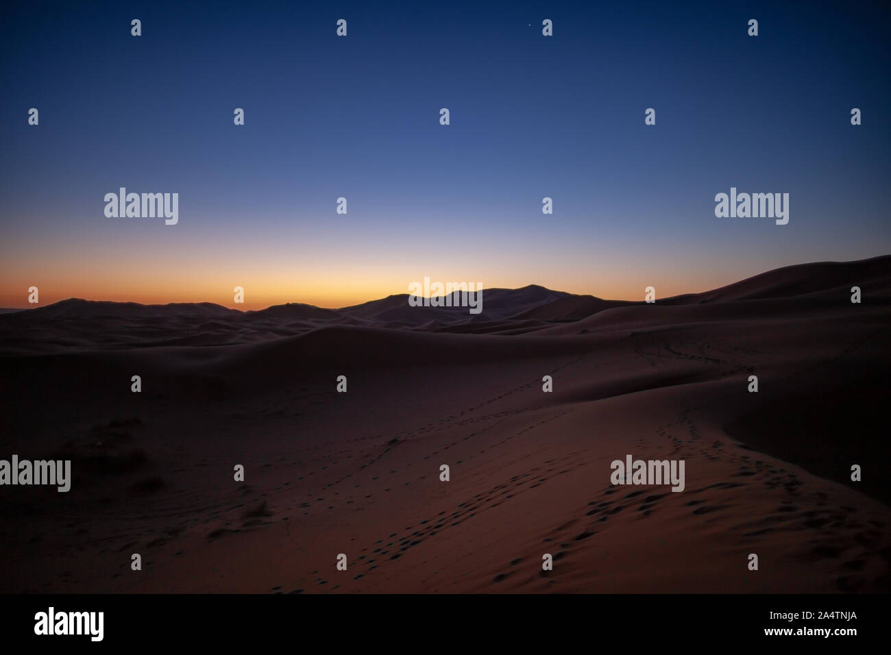 With the sand dunes formed by the sahara desert sand hi-res stock ...