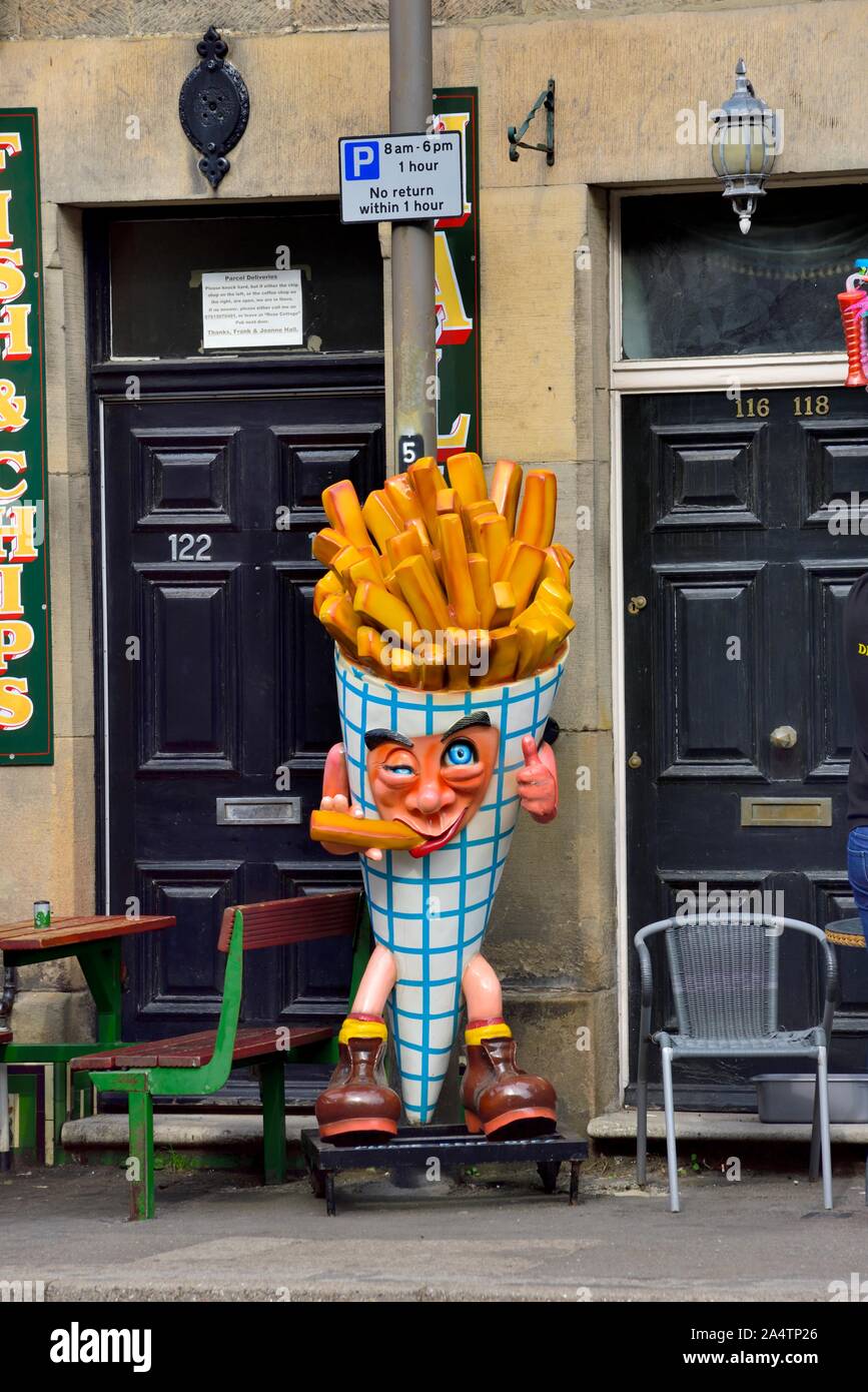 A giant cone of chips outside a fish and chip shop,Matlock Bath