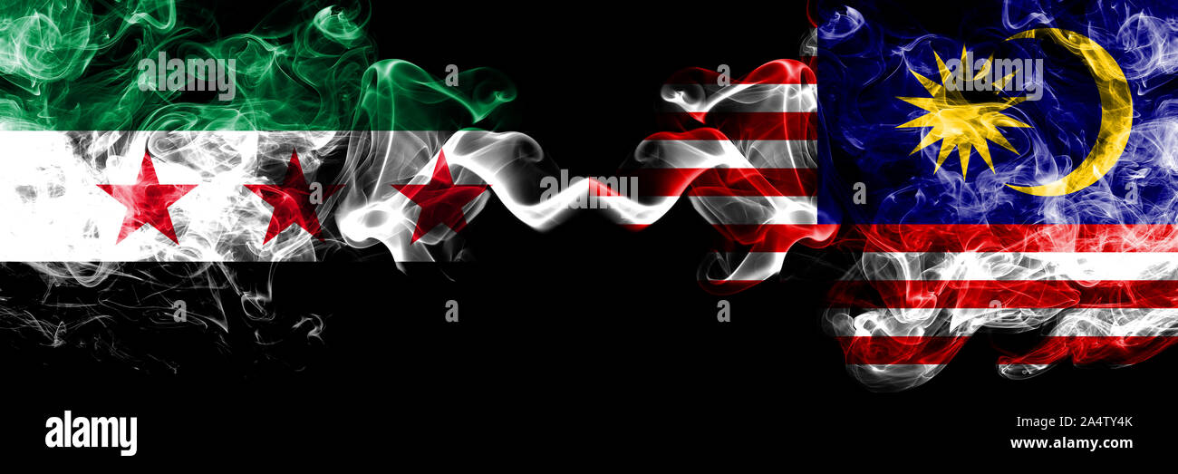 Syrian Arab Republic vs Malaysia Malaysian smoke flags placed side by Syrian Arab Republic vs Malaysia Malaysian smoke flags placed side by