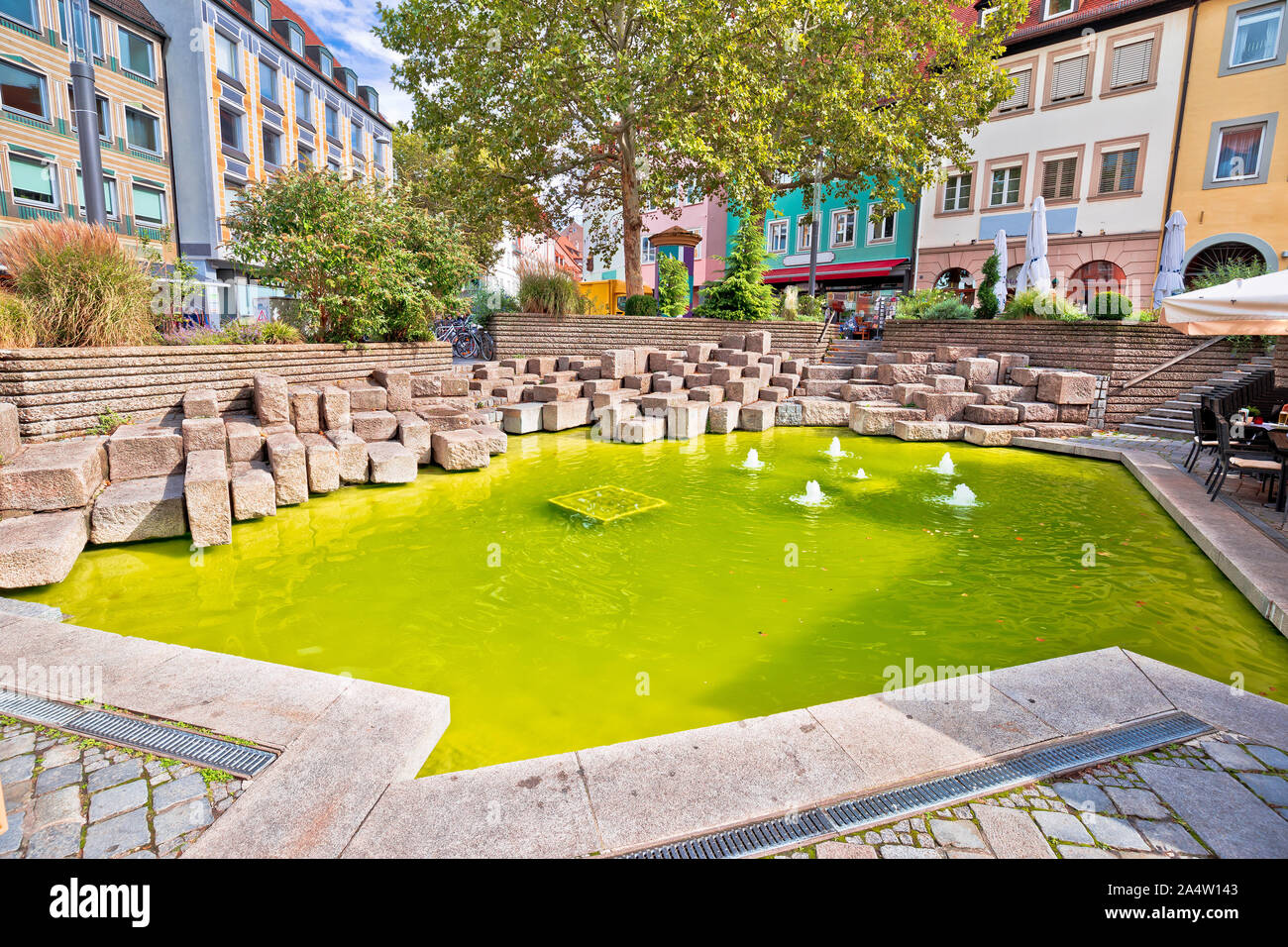 Bamberg. Colorful green fountain pond in historic town of Bamberg, Upper Franconia, Bavaria region of Germany Stock Photo