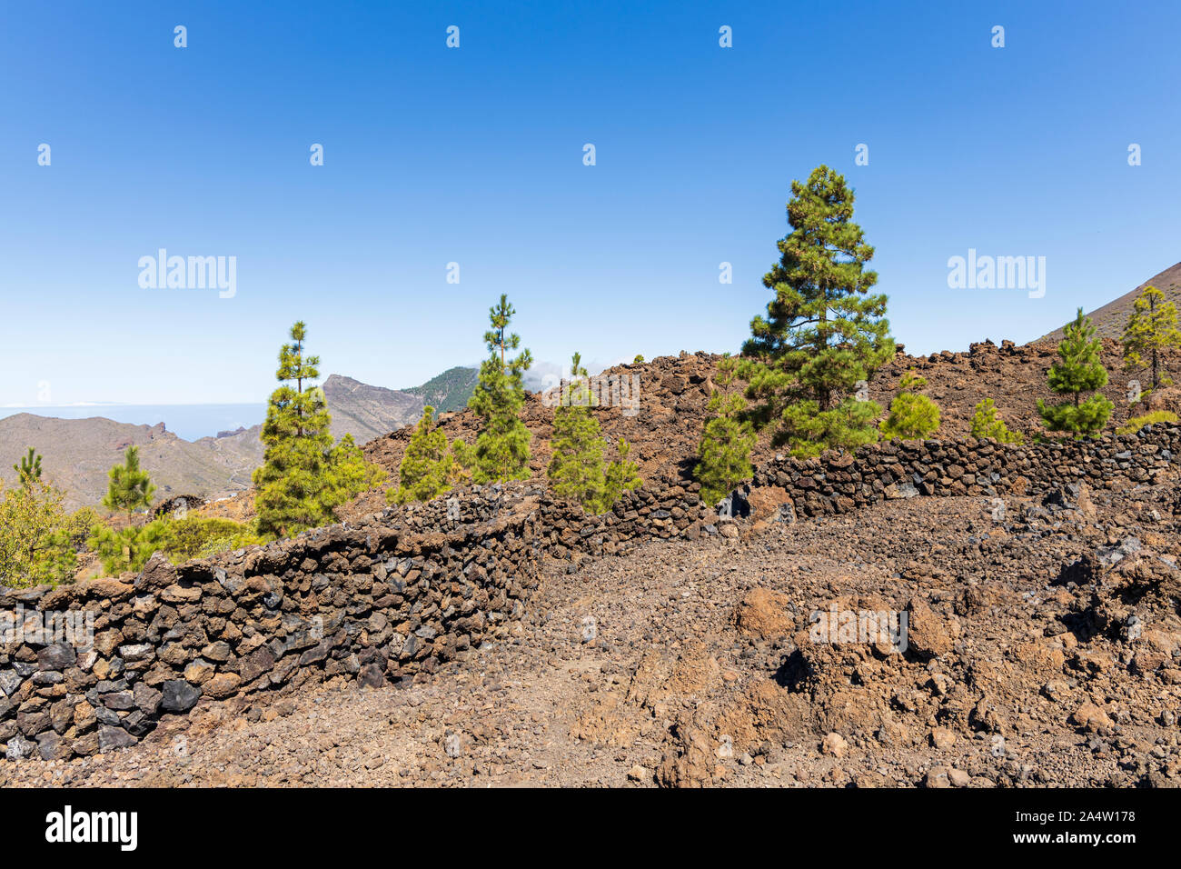 Dry stone wall built with lava rock above Valle Arriba, Santiago del Teide, Tenerife, Canary Islands, Spain Stock Photo