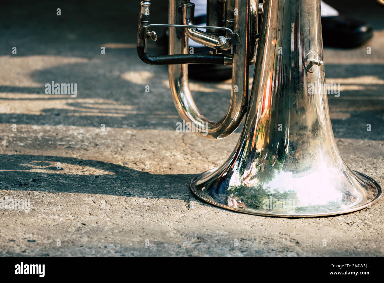 Old musical instrument on the ground Stock Photo - Alamy