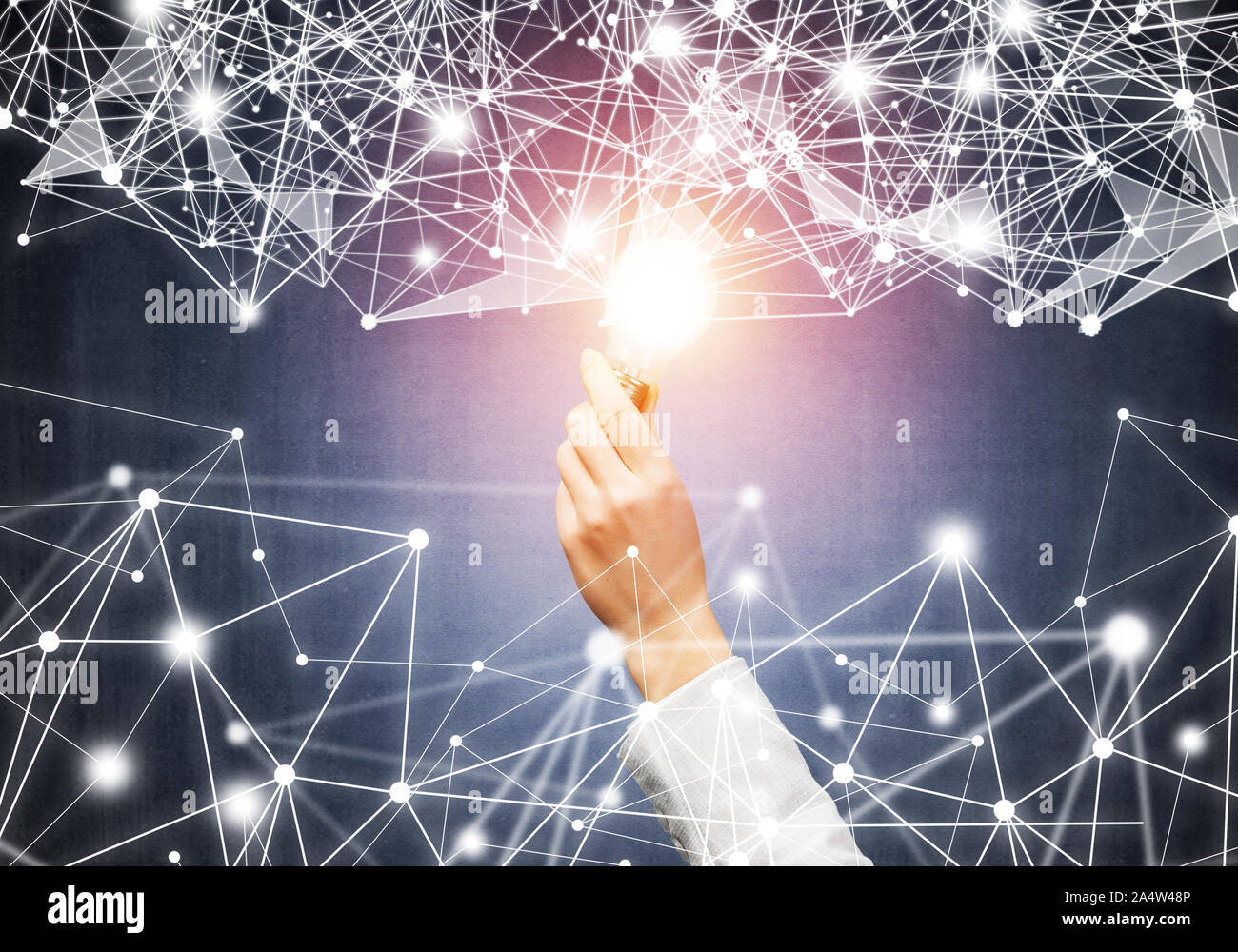 Woman hand holding glowing light bulb and abstract network structure on ...