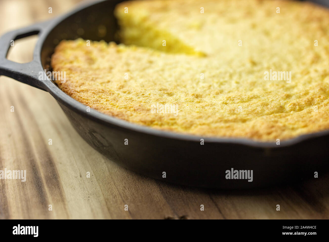 Traditional Southern cornbread baked in a cast iron skillet Stock Photo