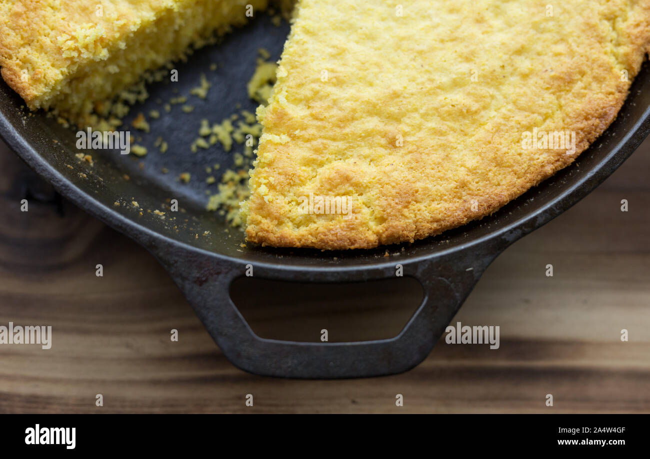 Traditional Southern cornbread baked in a cast iron skillet Stock Photo