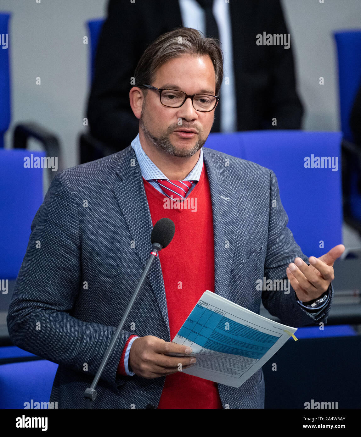 Berlin, Germany. 16th Oct, 2019. Florian Pronold (SPD), Parliamentary State Secretary in the Federal Ministry for the Environment, Nature Conservation and Nuclear Safety, will answer questions from members of the German Bundestag during Question Time at the plenary session of the German Bundestag. The main topics of the 117th session of the 19th legislative period are bills of the Federal Government on property tax reform, the questioning of the Federal Government and a current hour on the invasion of Turkey in Syria. Credit: Bernd von Jutrczenka/dpa/Alamy Live News Stock Photo