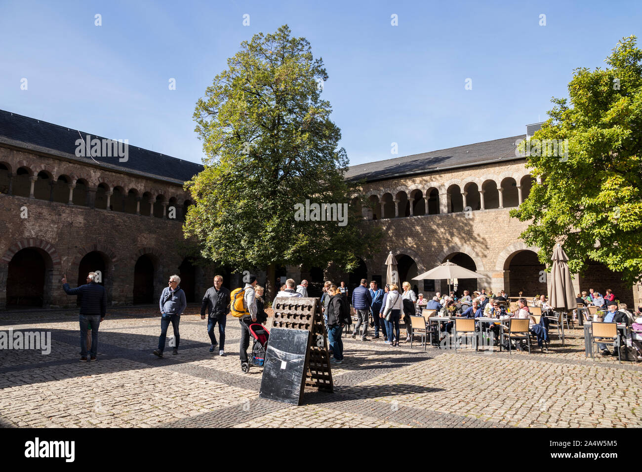 Trier, Germany. The inner courtyard of Simeonstift (St. Simeon's Collegiate Church), a former abbey now the City Museum Stock Photo