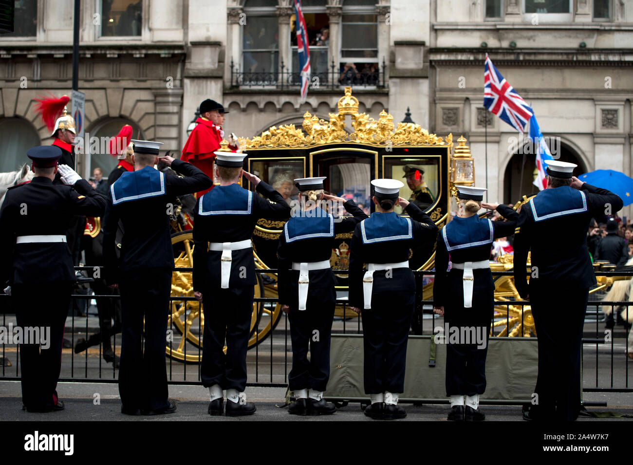 London, Westminster October 14th 2019 State Opening of Parliament. Royal Navy cadets salute the Royal carriage with Her Majesty the Queen and HRH Prin Stock Photo
