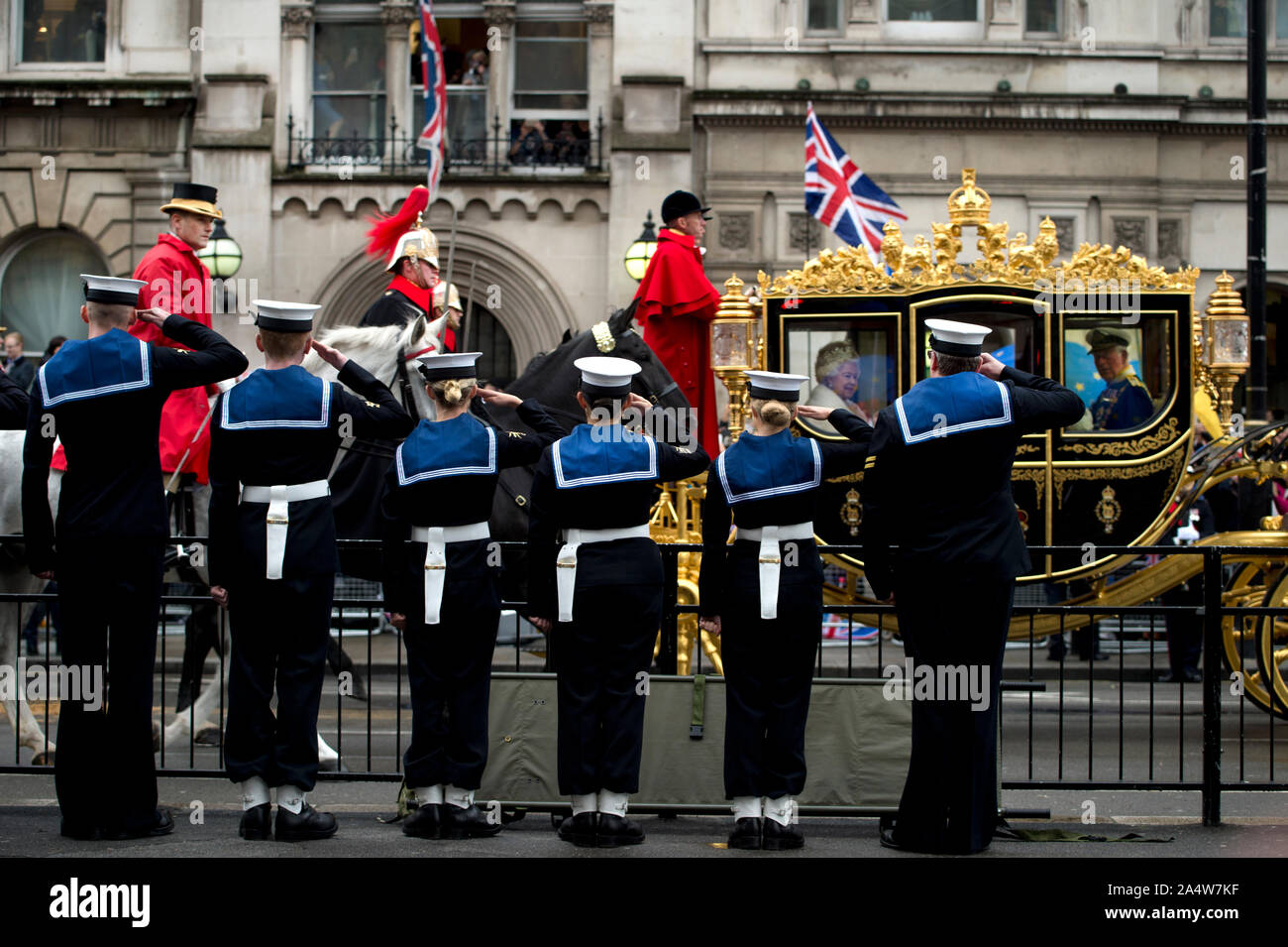 London, Westminster October 14th 2019 State Opening of Parliament. Royal Navy cadets salute the Royal carriage with Her Majesty the Queen and HRH Prin Stock Photo