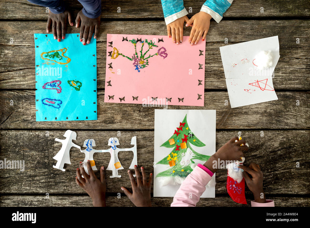 Children playing table above hands hi-res stock photography and images ...
